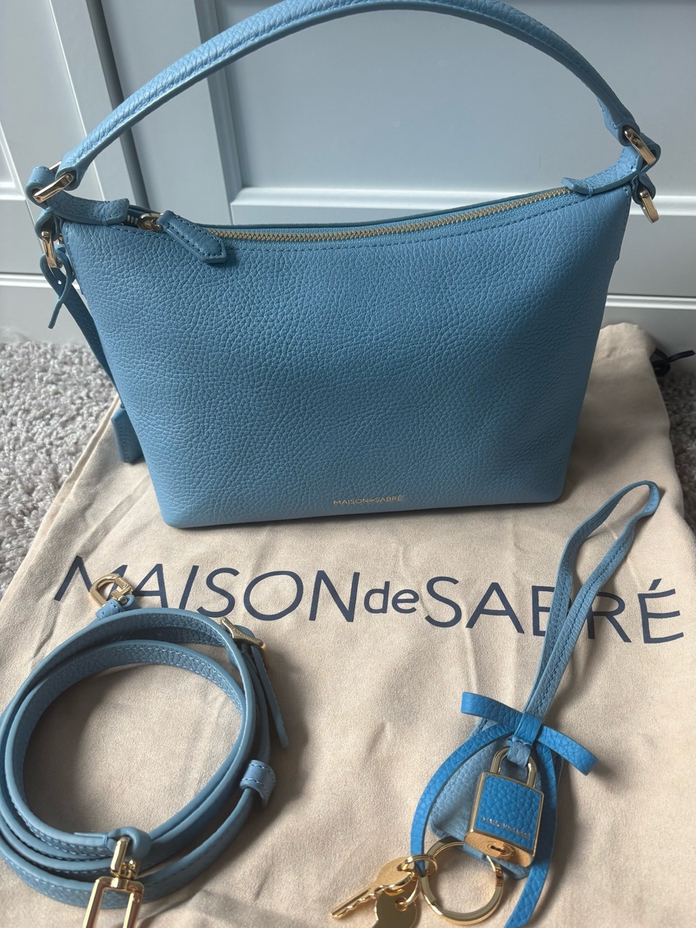 Maison de SABRÉ Sky Blue Pebbled Leather Crossbody Bag with Additional Bag Charm